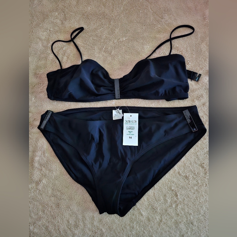 Calvin Klein 2pc Swimming suit. Size 14. Color Black.